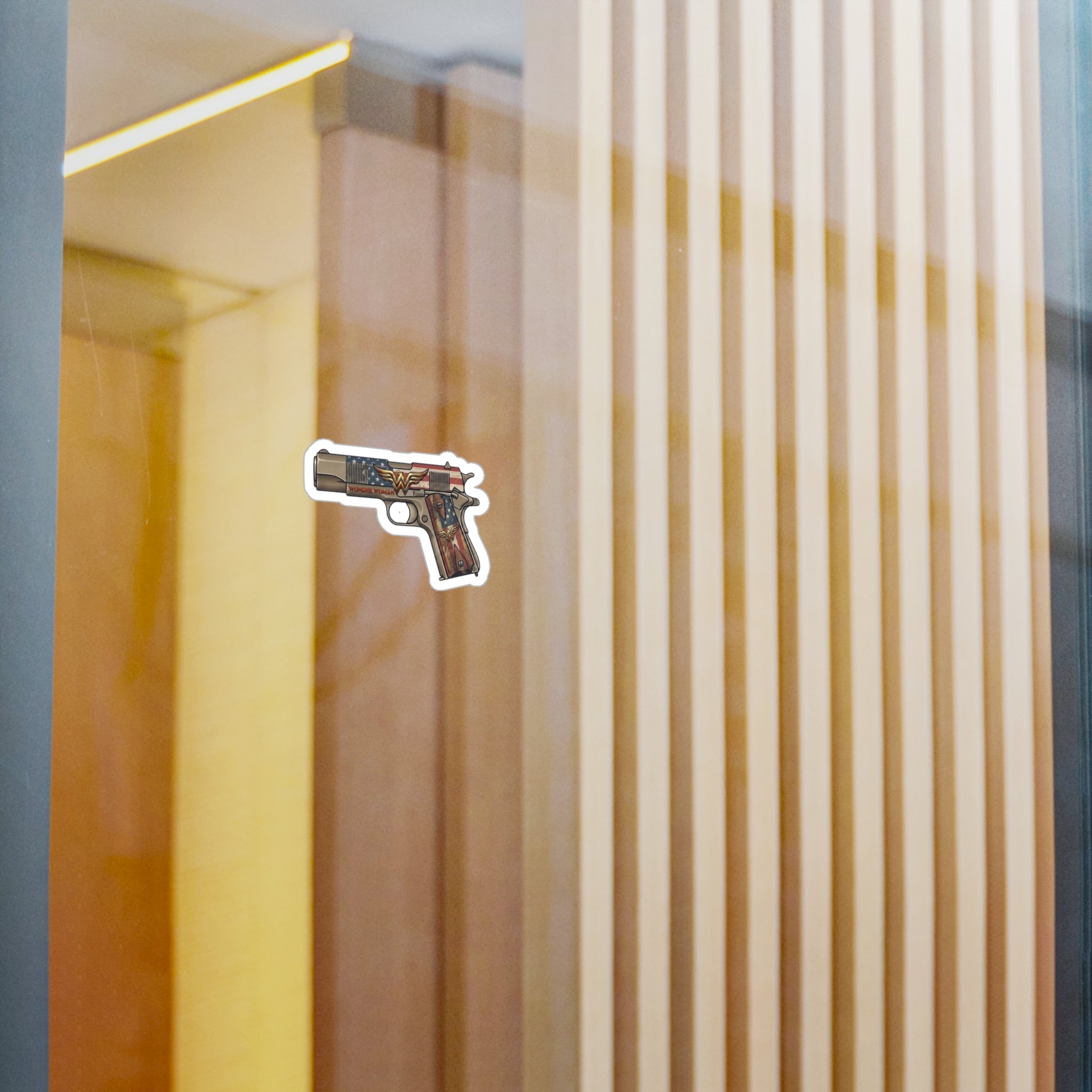 Wonder Woman Pistol Vinyl Sticker — American Flag & Vintage Firearm Kiss-Cut Decal