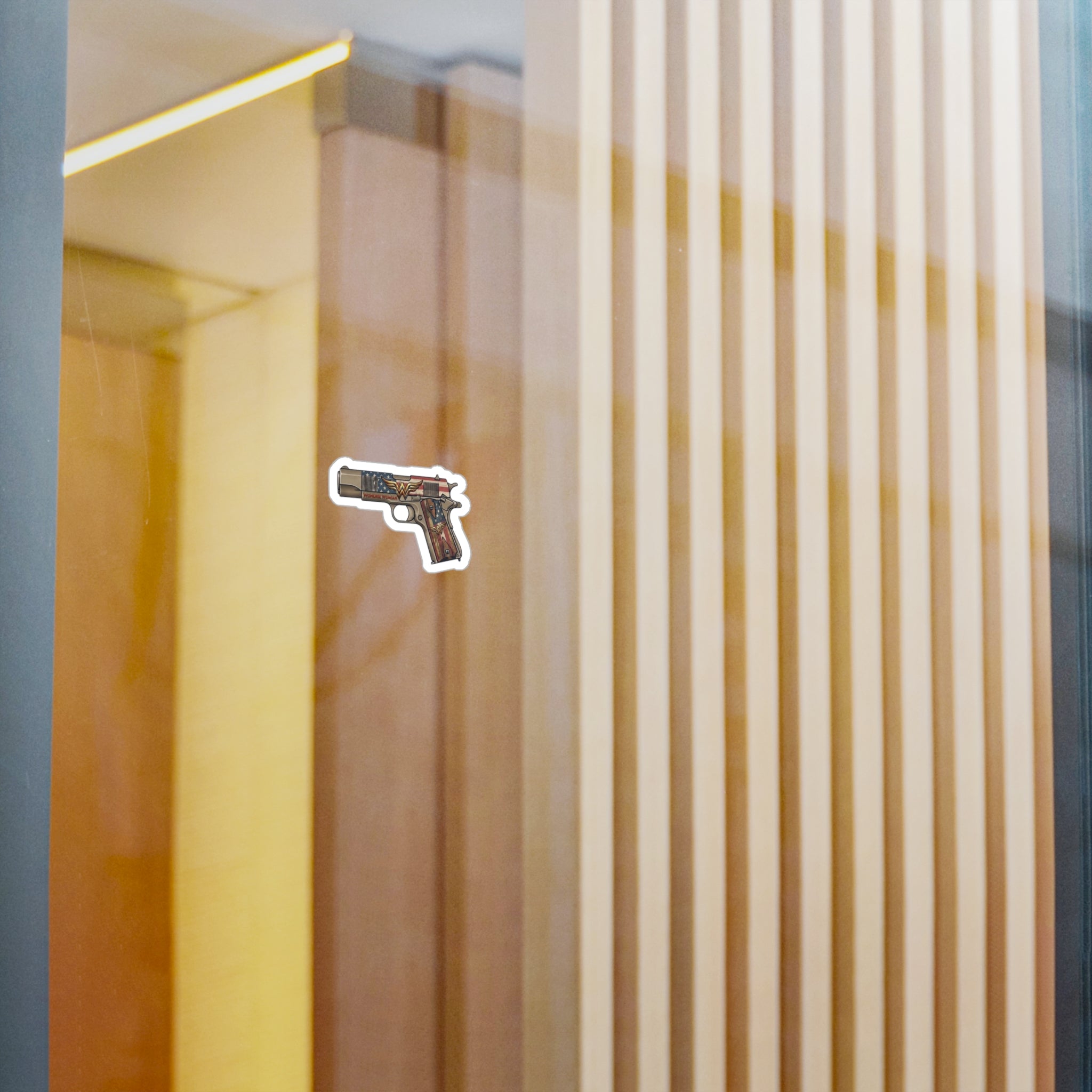 Wonder Woman Pistol Vinyl Sticker — American Flag & Vintage Firearm Kiss-Cut Decal
